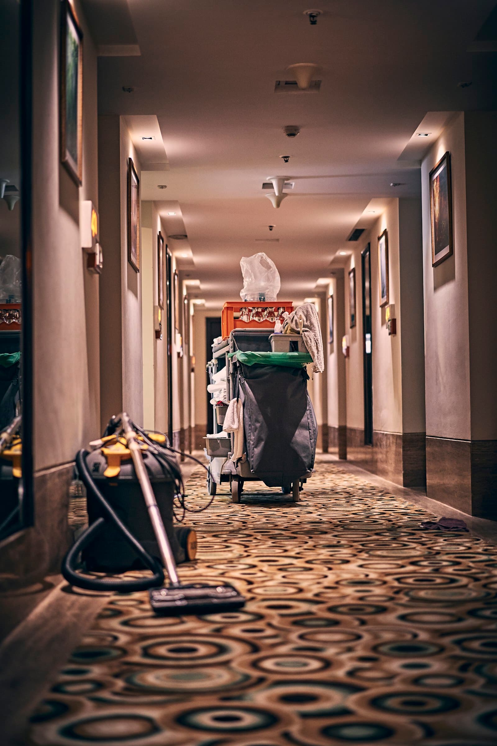 Hotel corridor with housekeeping cart