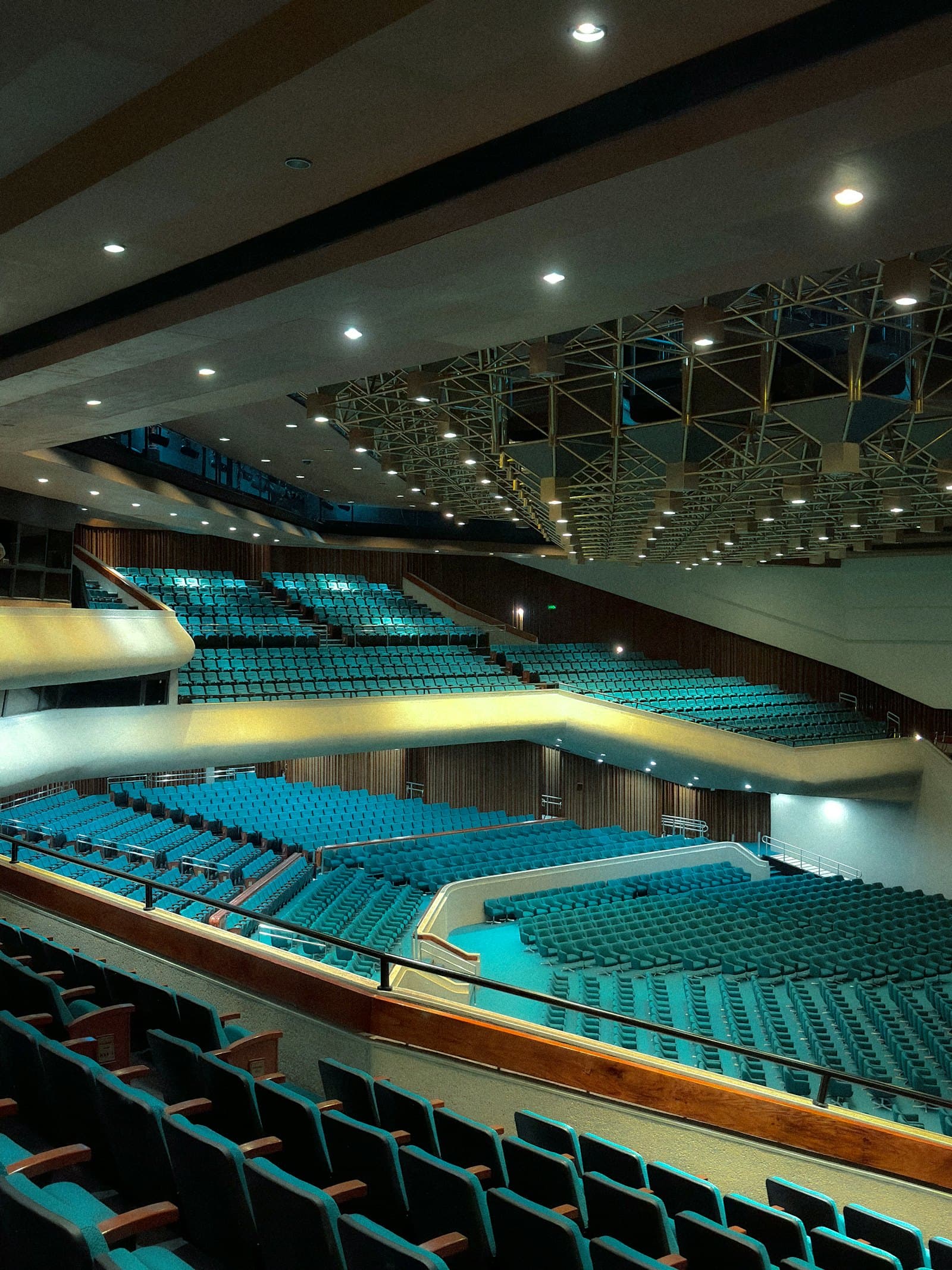 Empty arena with teal seating