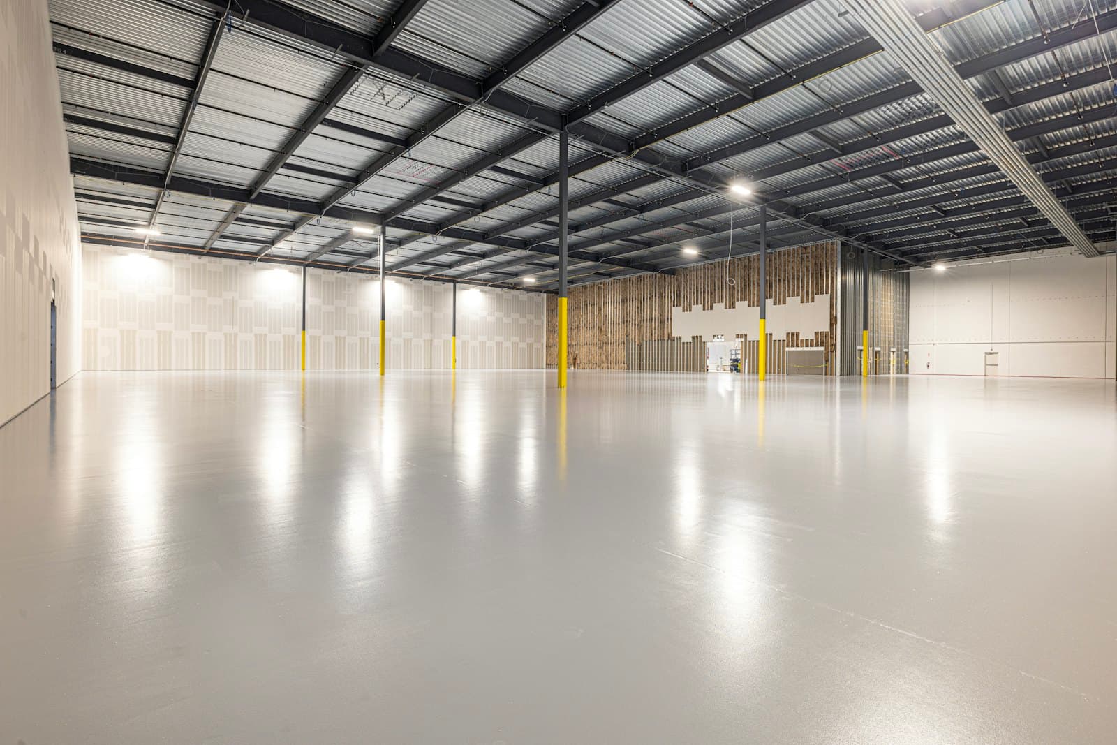 Large clean warehouse with polished concrete floor